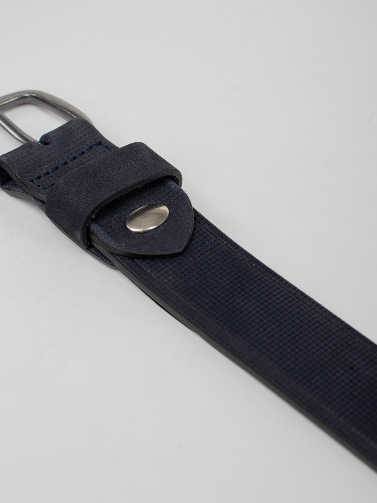 Embossed leather belt