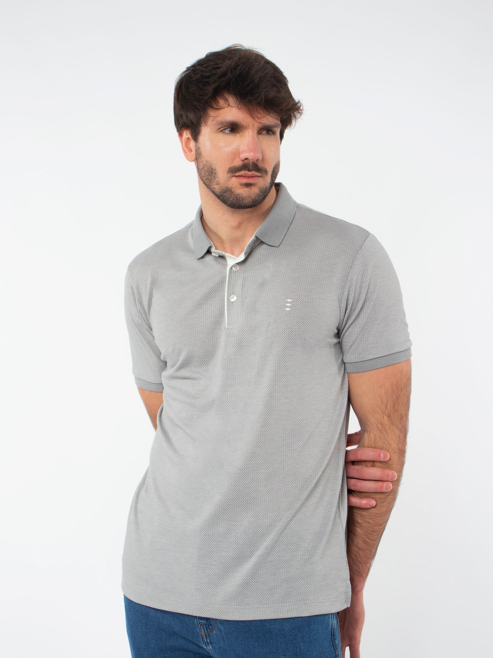 Polo jacquard con detalles
