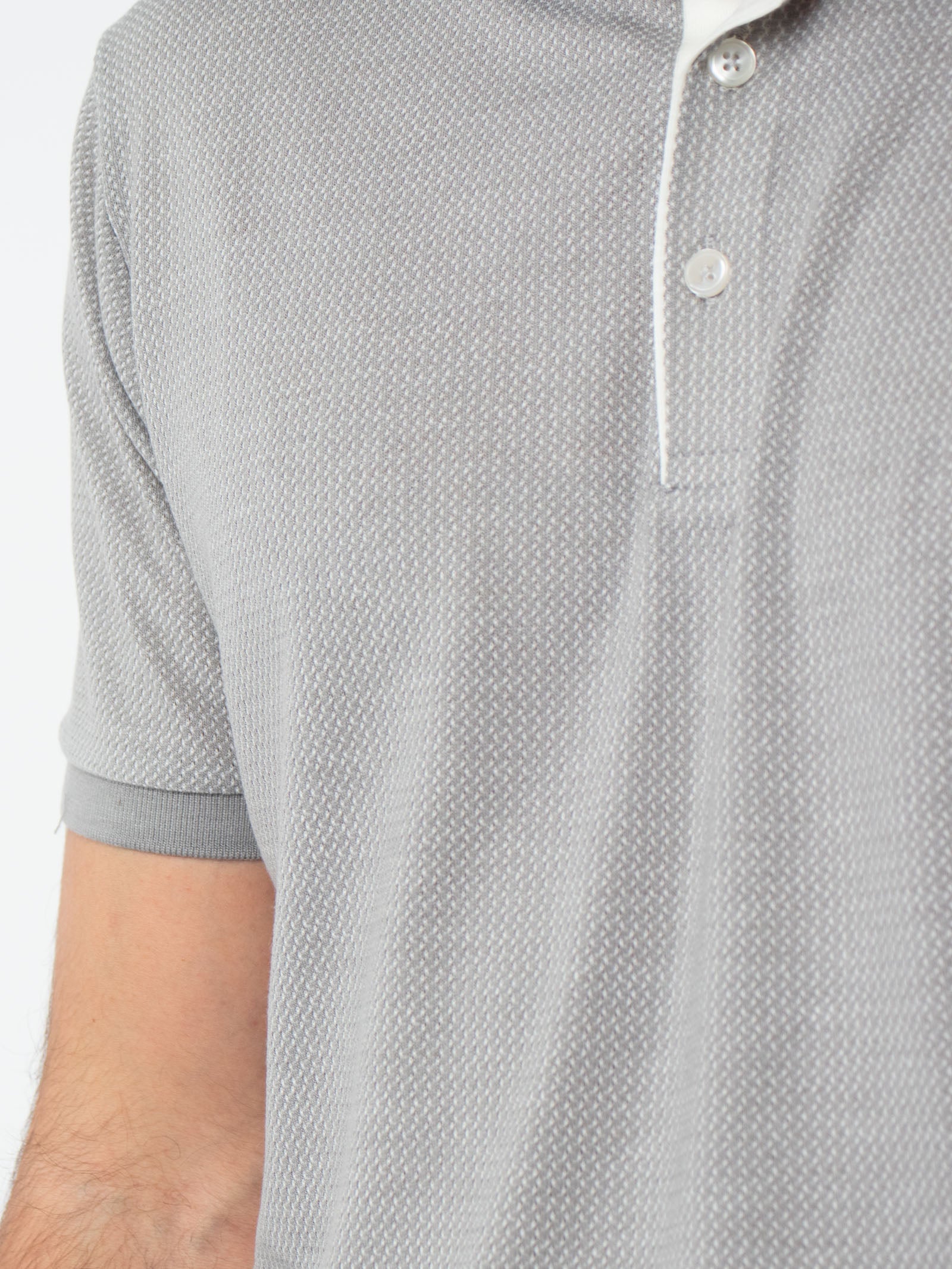 Polo jacquard con detalles