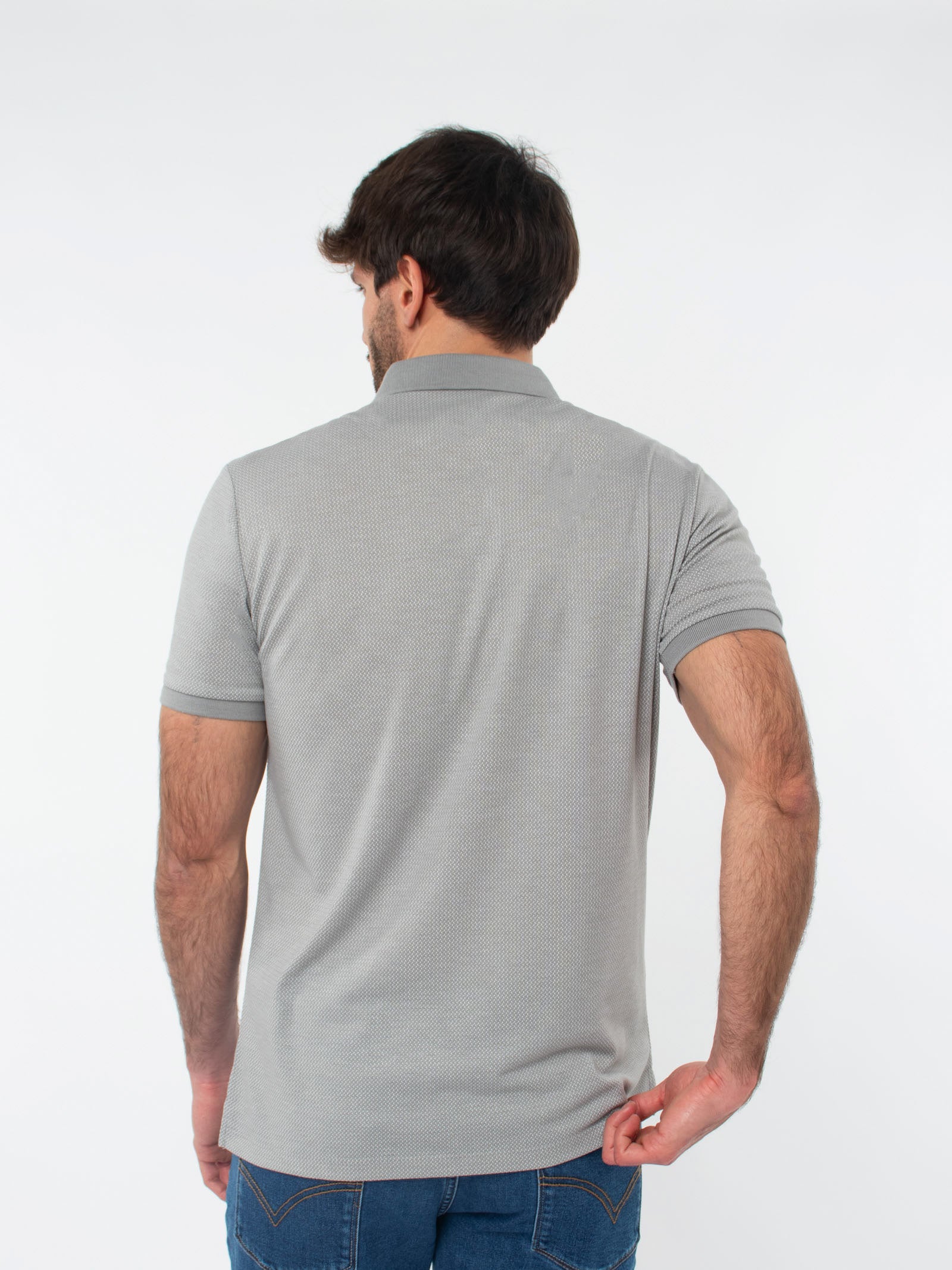 Polo jacquard con detalles