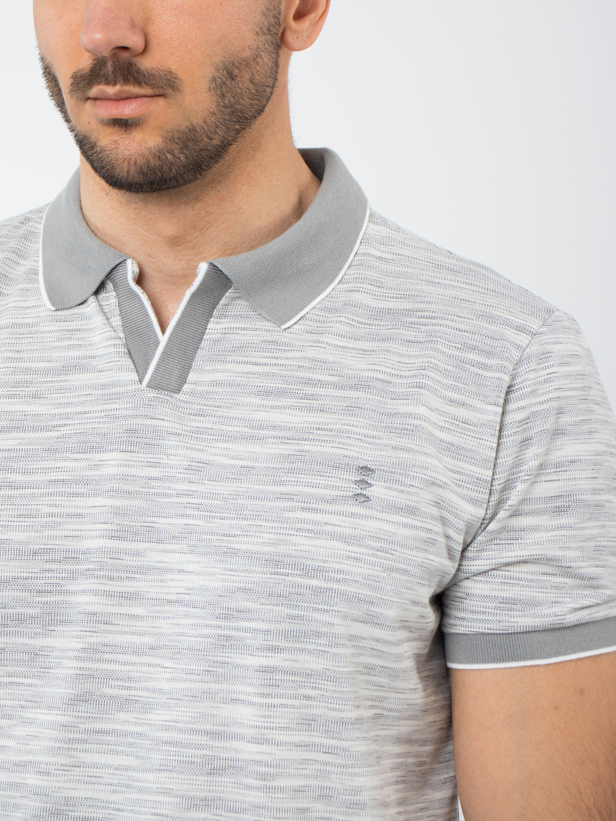 Polo shirt with heathered effect