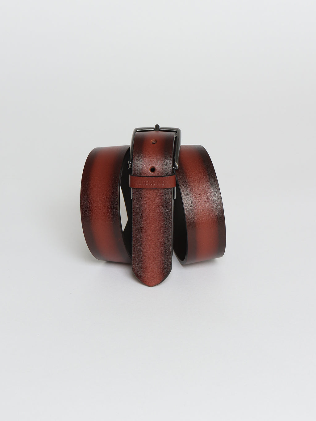Burnished edge leather belt