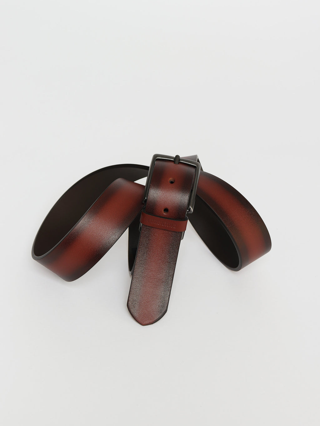 Burnished edge leather belt