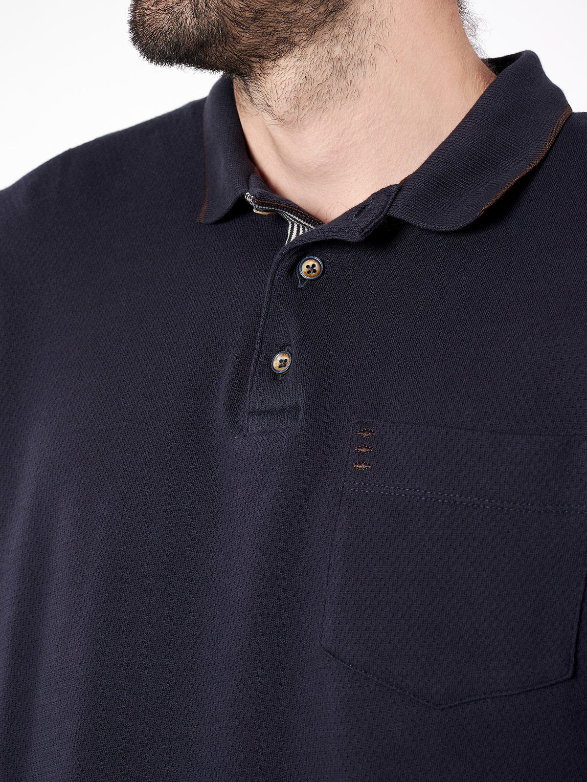 Polo jacquard con bolsillo